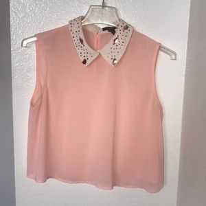 Collared crop top with gems.
